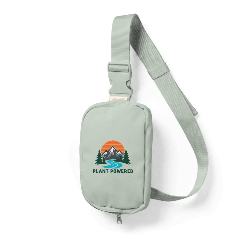 Bay Comfort Colors sling bag with the Mountain Roots landscape and PLANT POWERED lettering centered on the front.